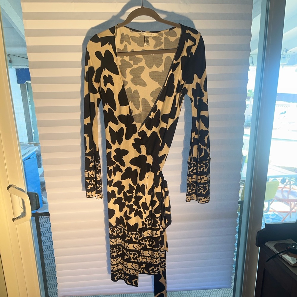 DVF iconic, classic wrap dress, rare black, and white butterfly design.